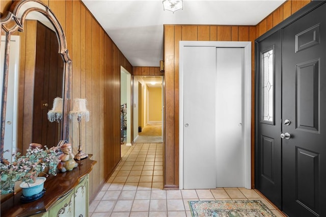 1805 Educational Dr, White Oak, PA 15131 - entryway with wood walls and light tile patterned floors