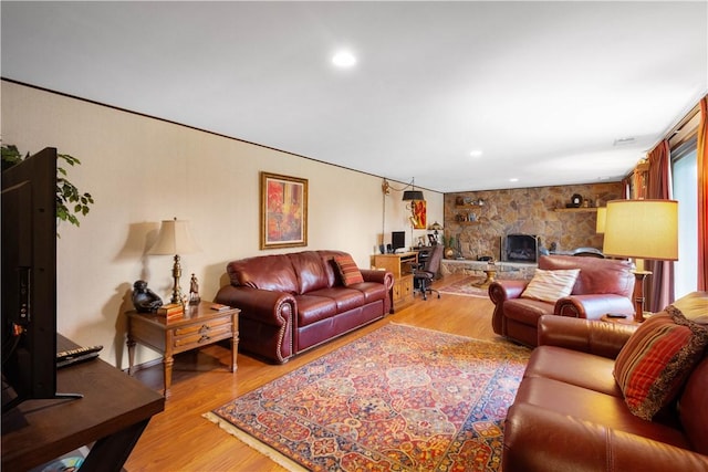 1805 Educational Dr, White Oak, PA 15131 - living room featuring a stone fireplace, recessed lighting, and wood finished floors