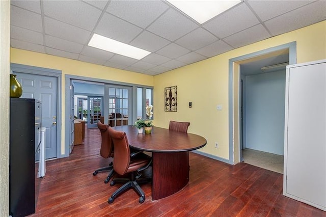 office area featuring french doors, wood finished floors, and a drop ceiling