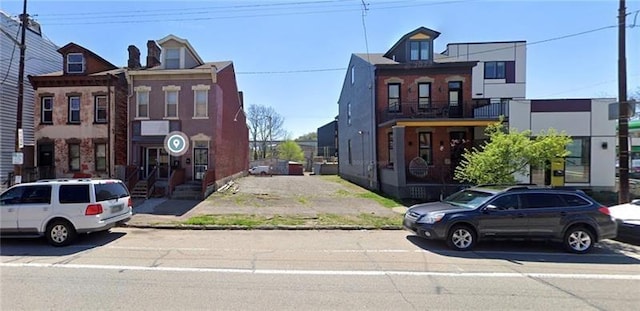 view of road featuring curbs