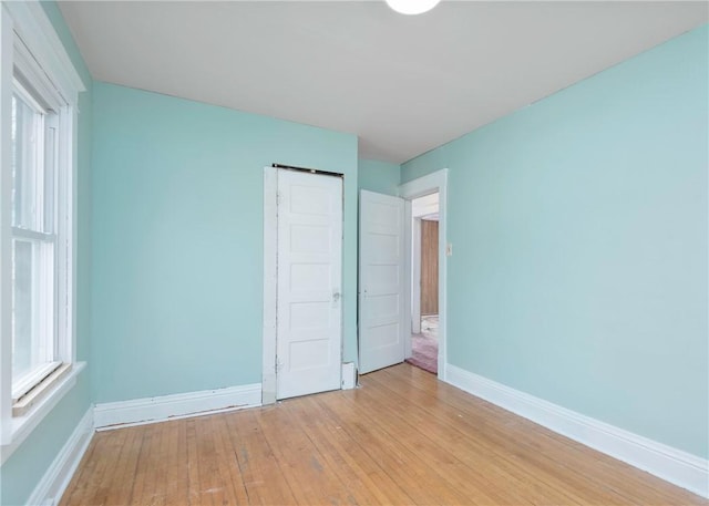 103 Timblin, Clay Twp, PA 16001 - unfurnished bedroom featuring baseboards and light wood-style floors