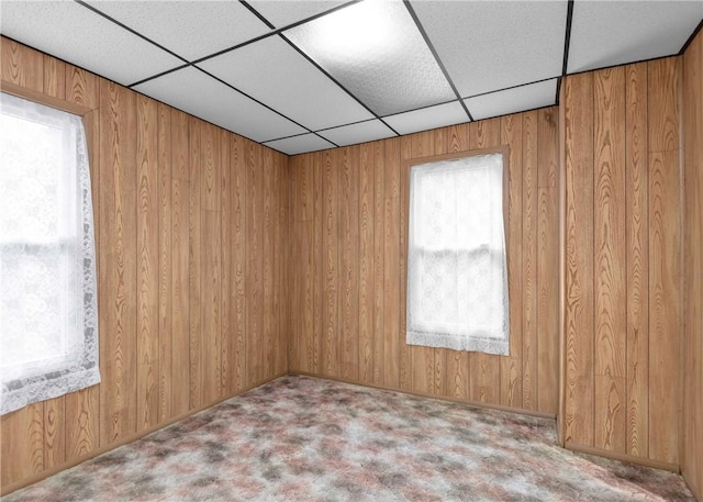 103 Timblin, Clay Twp, PA 16001 - carpeted empty room featuring a paneled ceiling and wooden walls