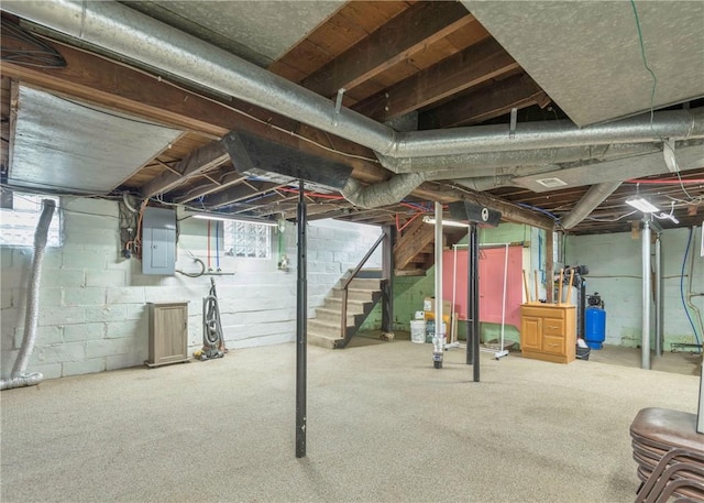 103 Timblin, Clay Twp, PA 16001 - below grade area featuring electric panel, stairway, and a water pressure tank