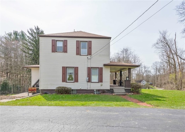 103 Timblin, Clay Twp, PA 16001 - view of front of home featuring covered porch and a front yard