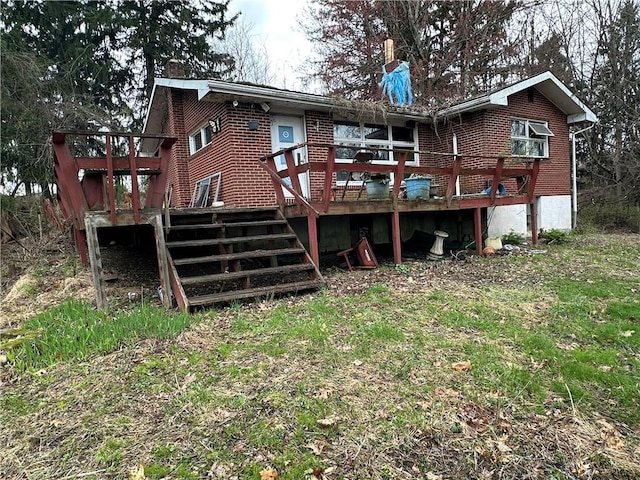3950 Dunnett Ln, Murrysville, PA 15668 - back of property featuring a chimney, stairs, a deck, and brick siding