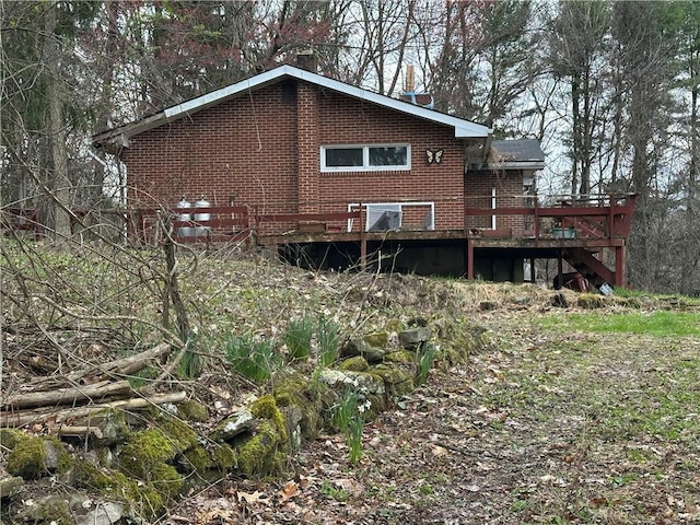 3950 Dunnett Ln, Murrysville, PA 15668 - back of property featuring brick siding and a deck
