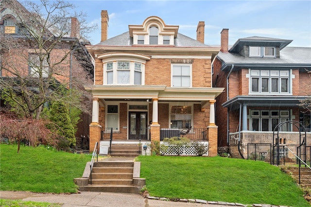 6429 Bartlett St, Squirrel Hill, PA 15217 - american foursquare style home featuring a porch, a front lawn, and brick siding