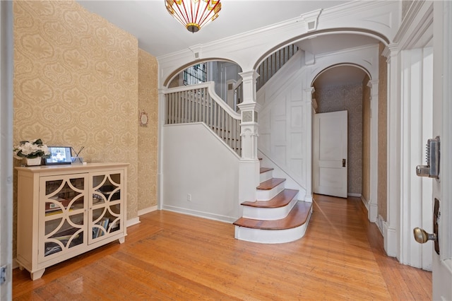 6429 Bartlett St, Squirrel Hill, PA 15217 - entryway with wallpapered walls, wood finished floors, and baseboards