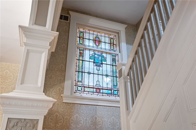 6429 Bartlett St, Squirrel Hill, PA 15217 - stairway featuring wallpapered walls, visible vents, and plenty of natural light