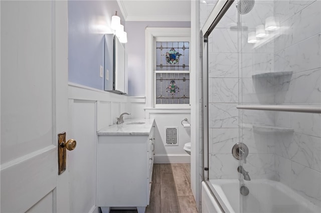 6429 Bartlett St, Squirrel Hill, PA 15217 - full bathroom with tub / shower combination, vanity, ornamental molding, visible vents, and wainscoting