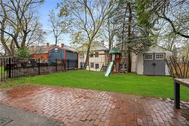 6429 Bartlett St, Squirrel Hill, PA 15217 - view of yard featuring a playground, a storage unit, fence, and an outdoor structure