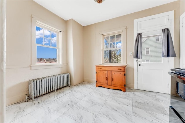 43-45 Union St, Uniontown, PA 15401 - interior space featuring a healthy amount of sunlight, radiator, and marble finish floor