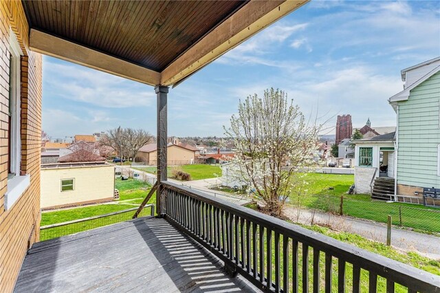 43-45 Union St, Uniontown, PA 15401 - wooden deck featuring a yard and a residential view