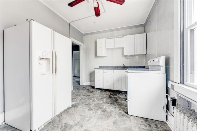 43-45 Union St, Uniontown, PA 15401 - kitchen featuring crown molding, ceiling fan, white fridge with ice dispenser, washer / dryer, and electric stove