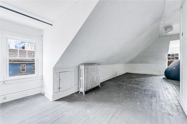 43-45 Union St, Uniontown, PA 15401 - additional living space featuring radiator heating unit, wood-type flooring, baseboards, and lofted ceiling