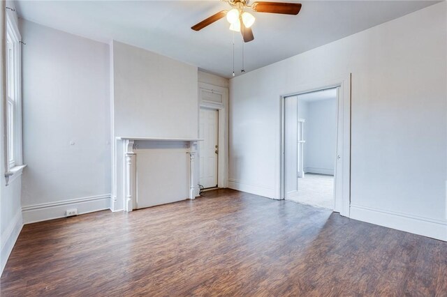 1415 Lager St, Troy Hill, PA 15212 - unfurnished living room with ceiling fan, wood finished floors, and baseboards