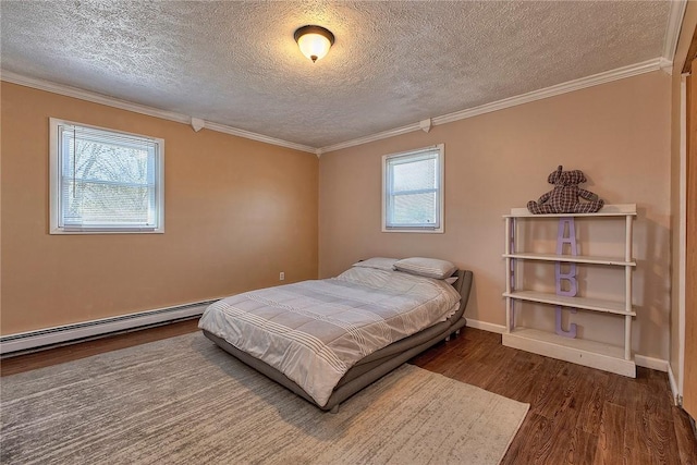 bedroom featuring multiple windows, a textured ceiling, and wood finished floors