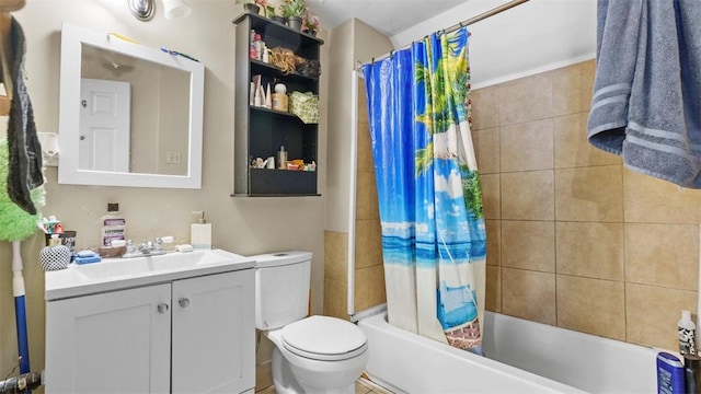 bathroom with toilet, vanity, and shower / tub combo with curtain