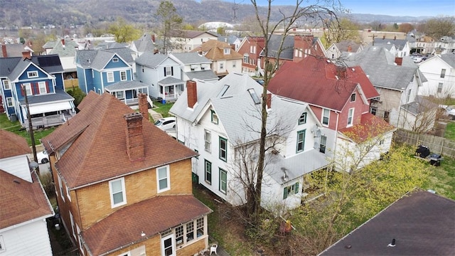 birds eye view of property with a residential view