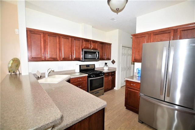 513 Madison Blvd, New Sewickley Twp, PA 15042 - kitchen featuring a sink, visible vents, light countertops, and appliances with stainless steel finishes