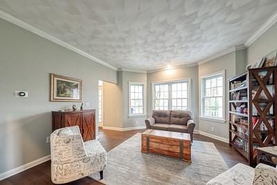 living area featuring crown molding, dark wood-style flooring, and baseboards