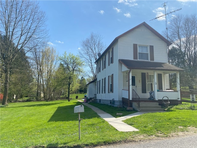 traditional home with a porch and a front yard