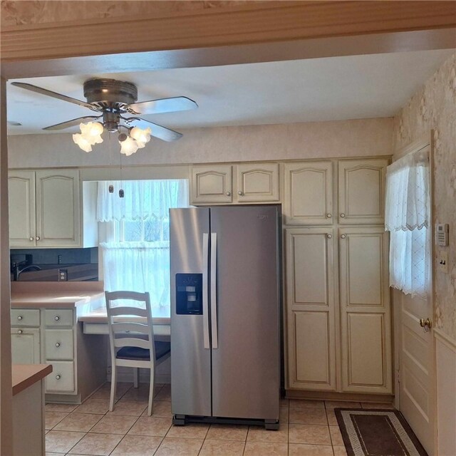 268 Coraopolis Rd, Robinson Twp Nwa, PA 15108 - kitchen featuring stainless steel refrigerator with ice dispenser, light tile patterned floors, ceiling fan, and light countertops