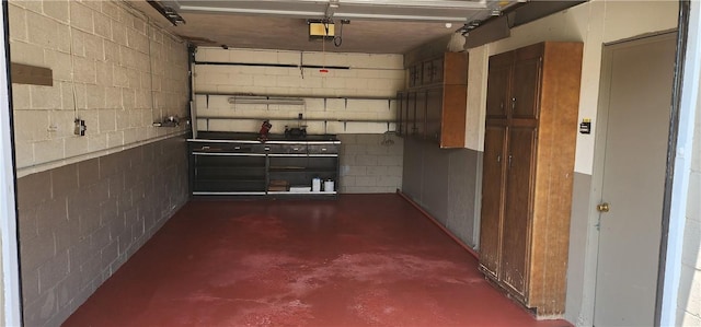 268 Coraopolis Rd, Robinson Twp Nwa, PA 15108 - garage with a garage door opener and concrete block wall