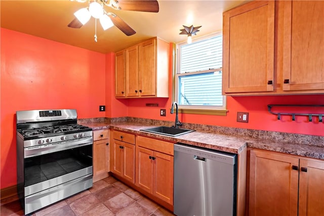 kitchen with a sink, ceiling fan, and appliances with stainless steel finishes