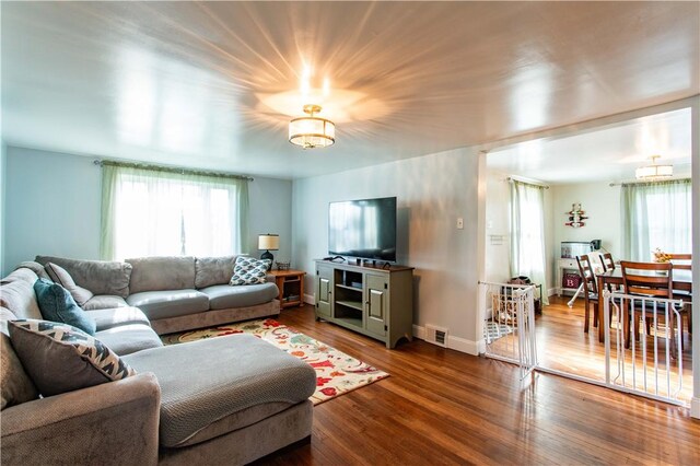 429 Big Knob Rd, New Sewickley Twp, PA 15074 - living room with visible vents, a wealth of natural light, wood finished floors, and baseboards