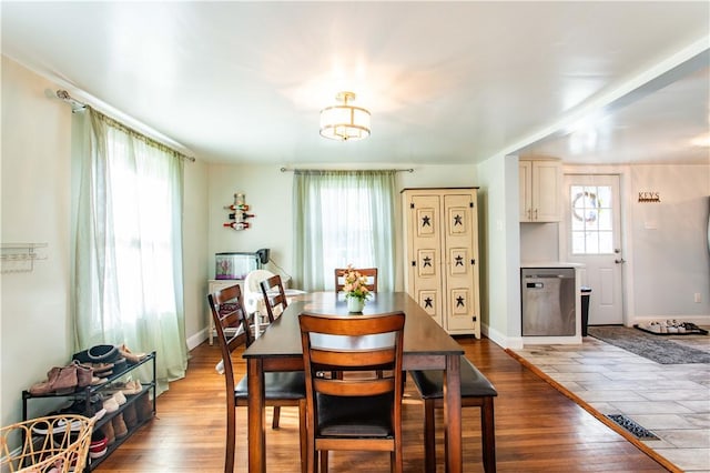 429 Big Knob Rd, New Sewickley Twp, PA 15074 - dining room with baseboards and wood finished floors
