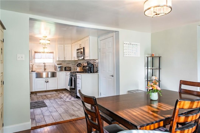 429 Big Knob Rd, New Sewickley Twp, PA 15074 - dining area with dark wood-style flooring
