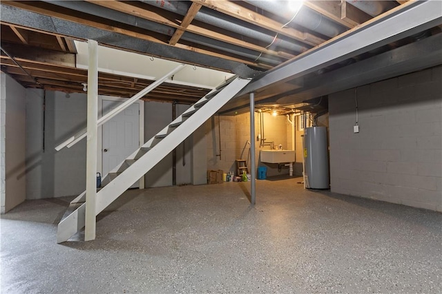 1226 Lamson Cir, Upper St Clair, PA 15241 - unfinished below grade area featuring concrete block wall, a sink, gas water heater, and stairway