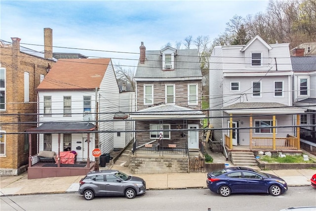 203 57th St, Lawrenceville, PA 15201 - view of property featuring covered porch