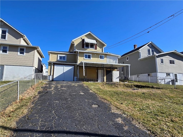 335 Main St, Centerville, PA 15358 - traditional-style home with driveway and a fenced backyard