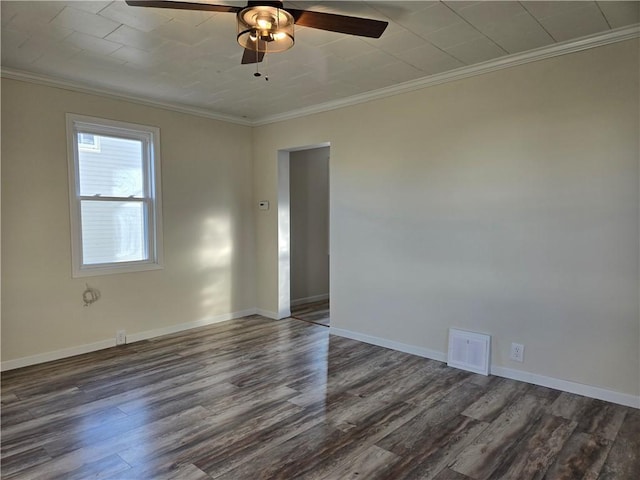 unfurnished room with baseboards, dark wood-style floors, crown molding, visible vents, and ceiling fan