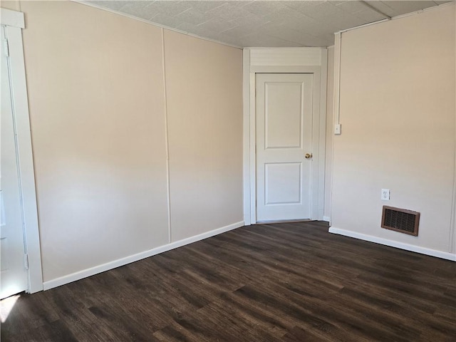 335 Main St, Centerville, PA 15358 - empty room featuring dark wood-style flooring