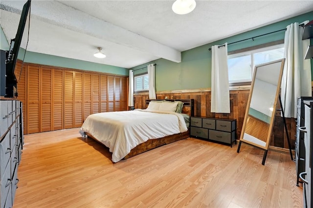 856 Spencer Ave, Sharon, PA 16146 - bedroom with light wood finished floors and beamed ceiling