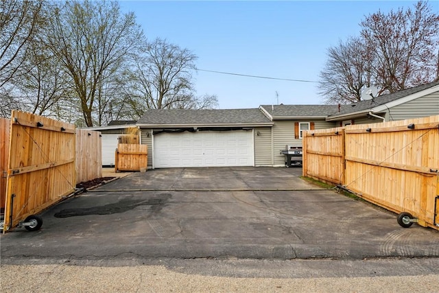 856 Spencer Ave, Sharon, PA 16146 - garage with aphalt driveway and fence