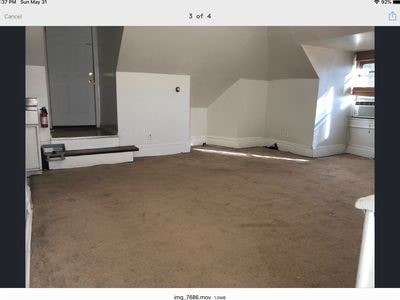 140 Washington Ave, Bellevue, PA 15202 - interior space with carpet floors, baseboards, and lofted ceiling