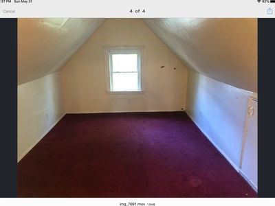 140 Washington Ave, Bellevue, PA 15202 - bonus room featuring dark colored carpet and lofted ceiling