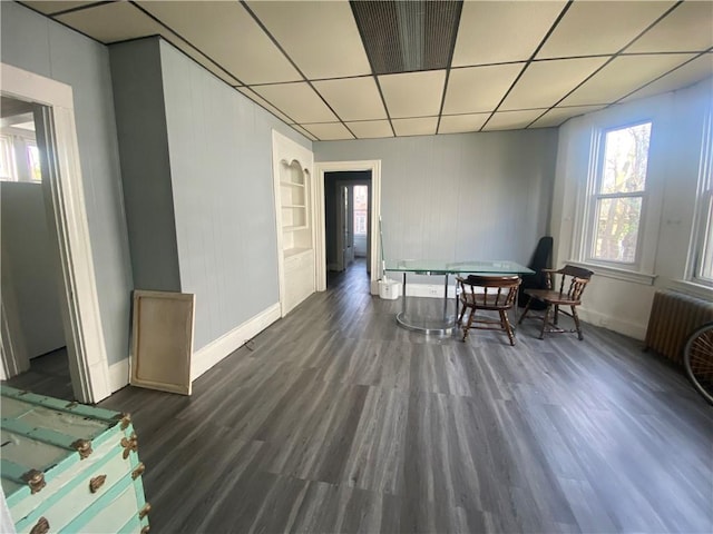 140 Washington Ave, Bellevue, PA 15202 - dining area featuring baseboards, wood finished floors, and a paneled ceiling