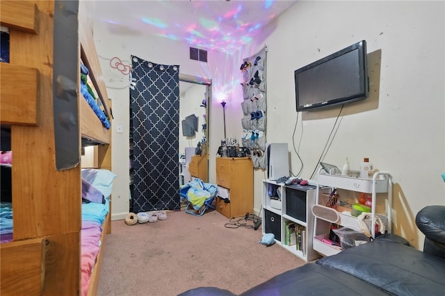 bedroom with carpet flooring and visible vents