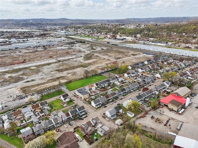 birds eye view of property with a residential view