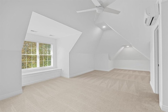bonus room featuring carpet floors, ceiling fan, vaulted ceiling, and a wall unit AC