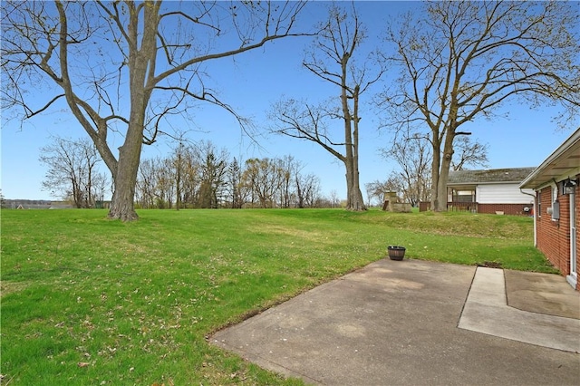 view of yard with a patio area