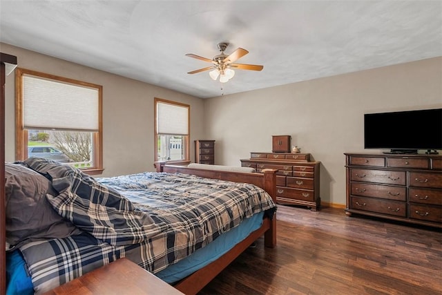 172 Valley Flds, Plum Boro, PA 15239 - bedroom featuring dark wood-style flooring, baseboards, multiple windows, and a ceiling fan