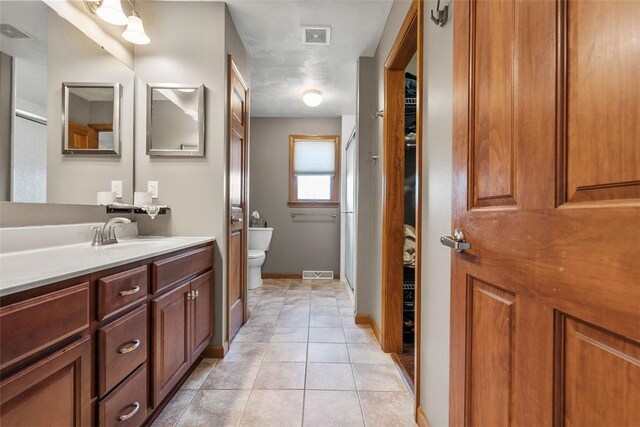 172 Valley Flds, Plum Boro, PA 15239 - bathroom with visible vents, toilet, and tile patterned floors