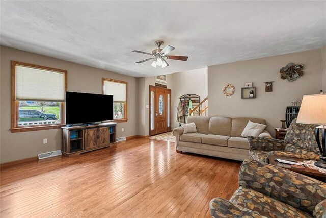 172 Valley Flds, Plum Boro, PA 15239 - living area with light wood-type flooring, ceiling fan, visible vents, and a wealth of natural light