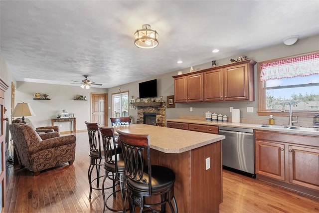 172 Valley Flds, Plum Boro, PA 15239 - kitchen with a kitchen breakfast bar, dishwasher, a sink, open floor plan, and plenty of natural light